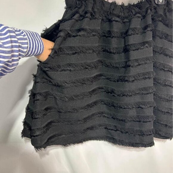 Woman’s black fringe skirt with pockets. Size 10. - Picture 9 of 10